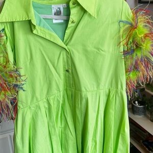Vibrant Green Dress with Colorful Feather Accents
